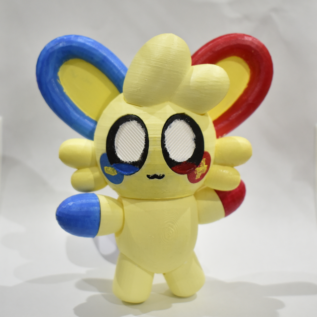 A plastic, figurine doll of Magnet, a character designed by kirbyzaz.svg